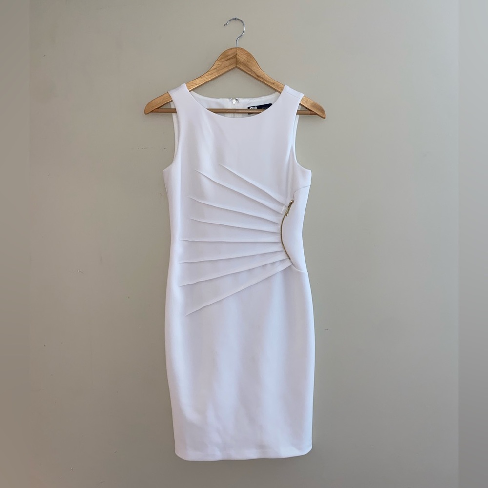 White dress with gold zipper detail
